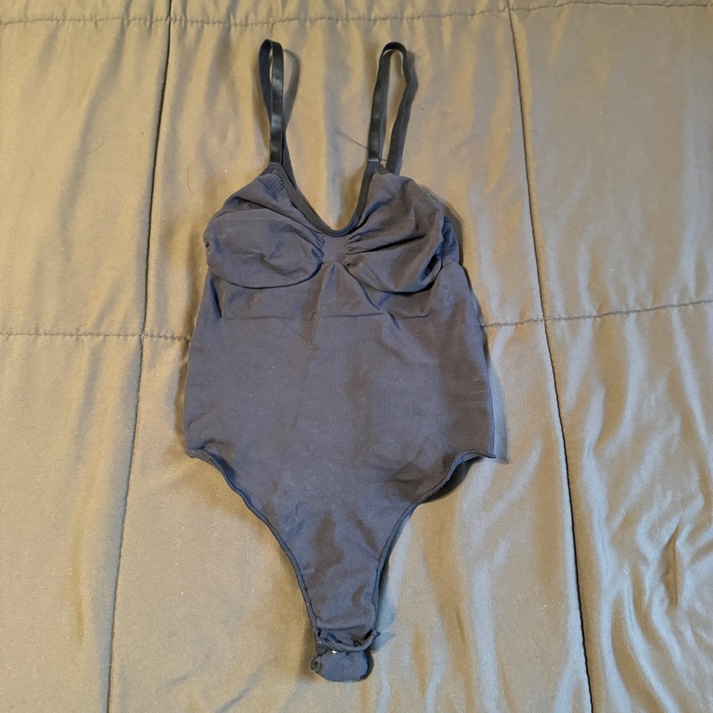 SKIMS Seamless Sculpt Thong Bodysuit in Shade “Onyx”